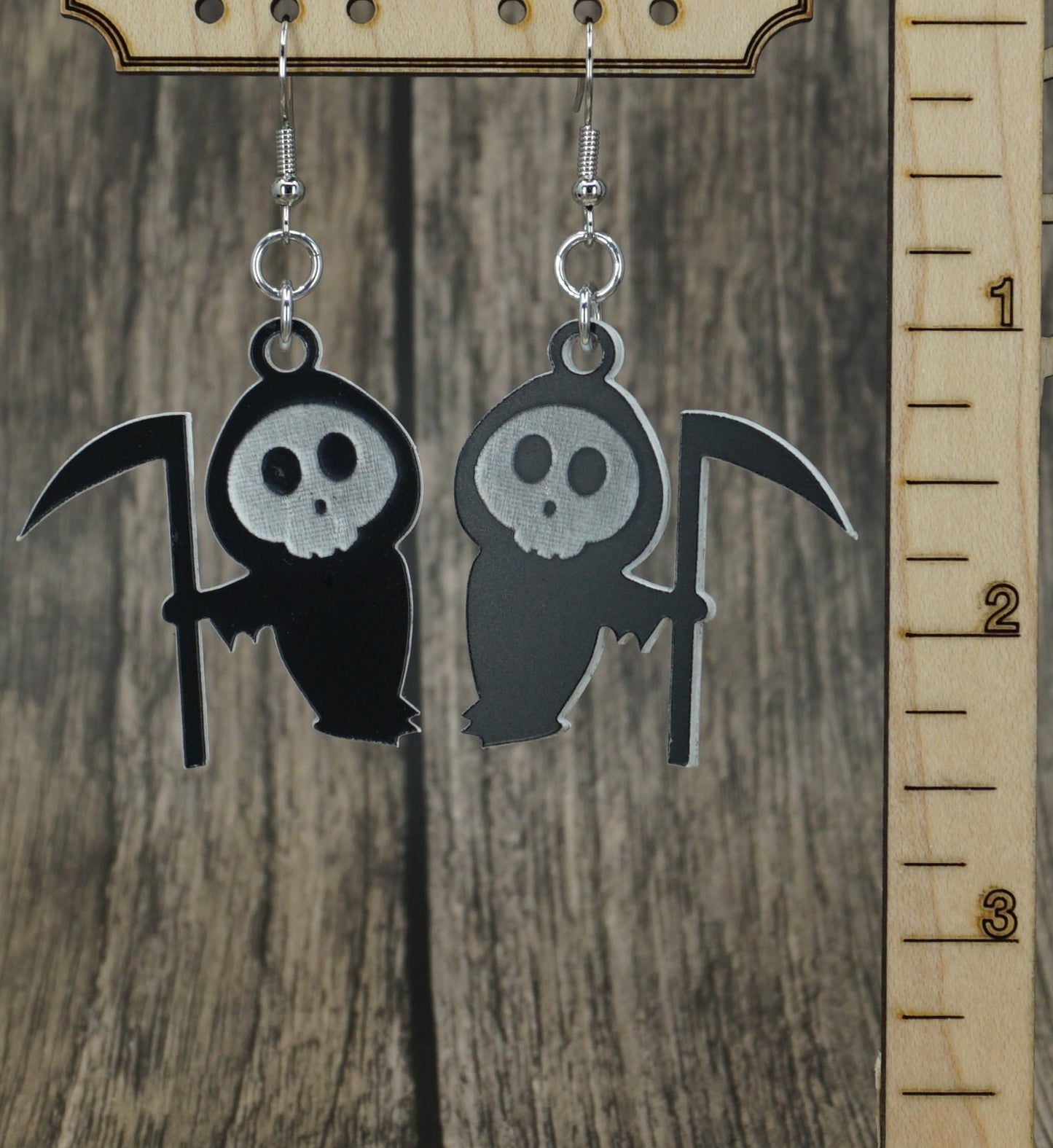 Black and white grim reaper earrings
