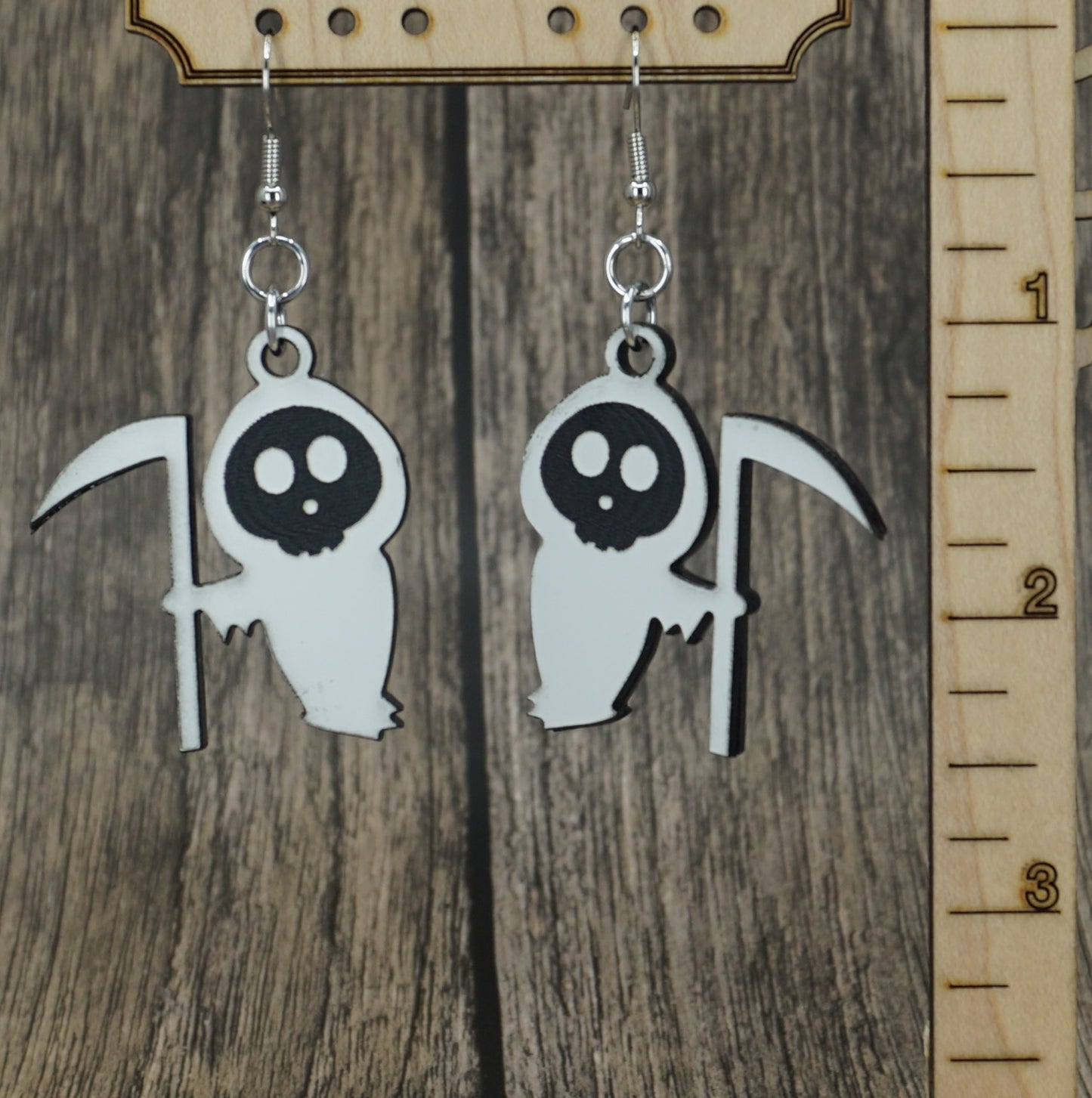 white black grim reaper earrings
