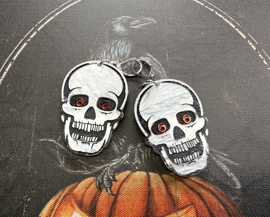 Red eyed skull earrings