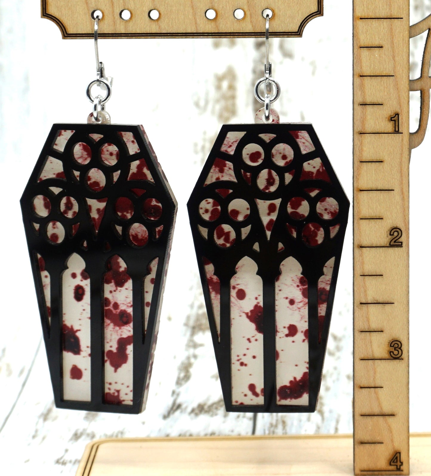 coffin blood round earrings