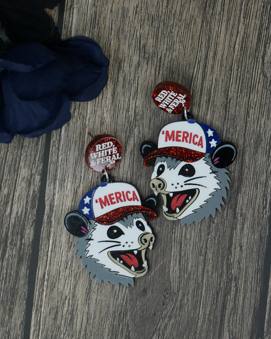 feral possum earrings