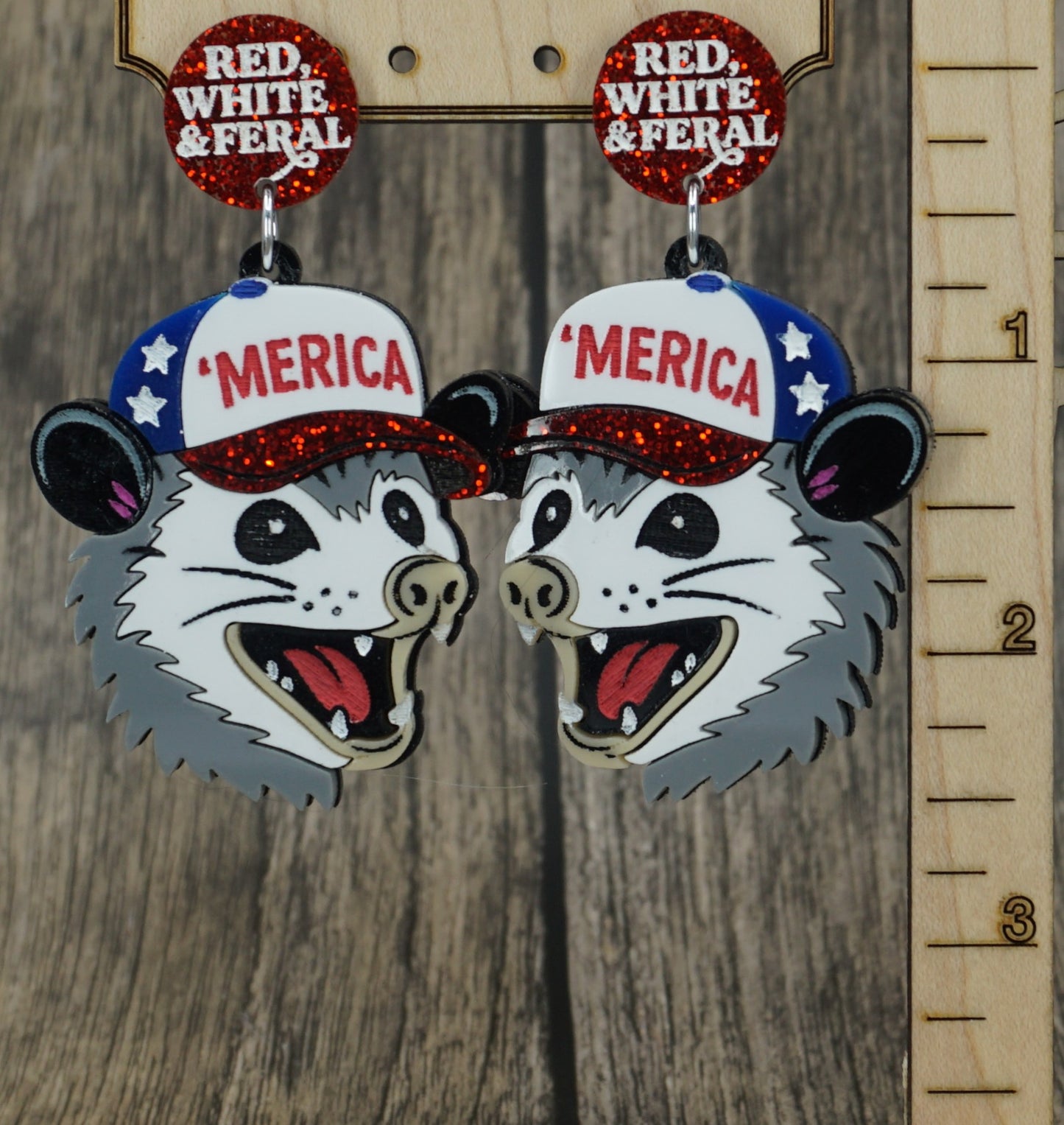 feral possum earrings