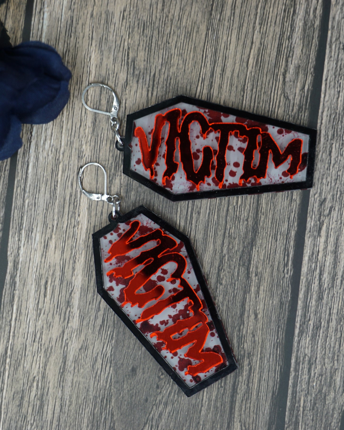 victim coffin earrings