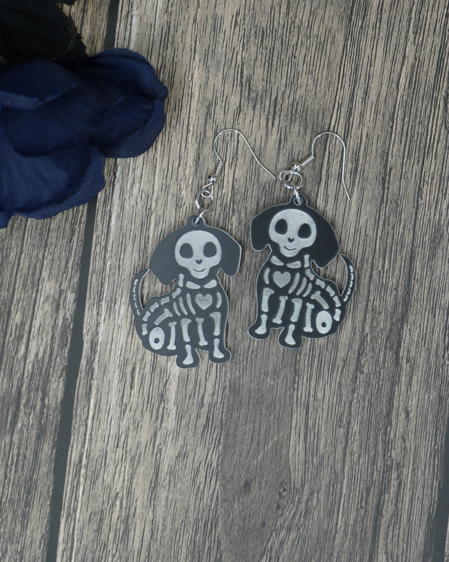 black and white small dog skeleton earrings