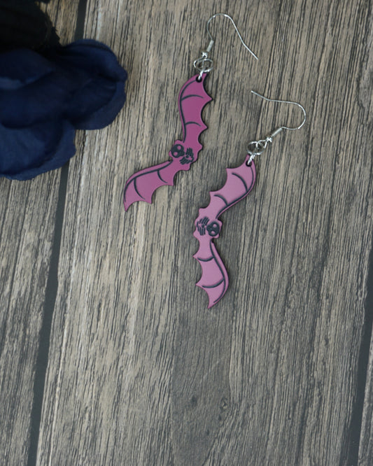 pink and black bat earrings